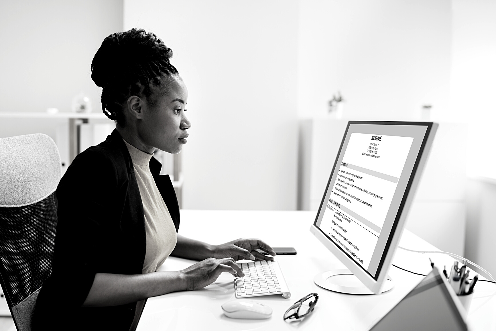 African Business Manager Reading Resume